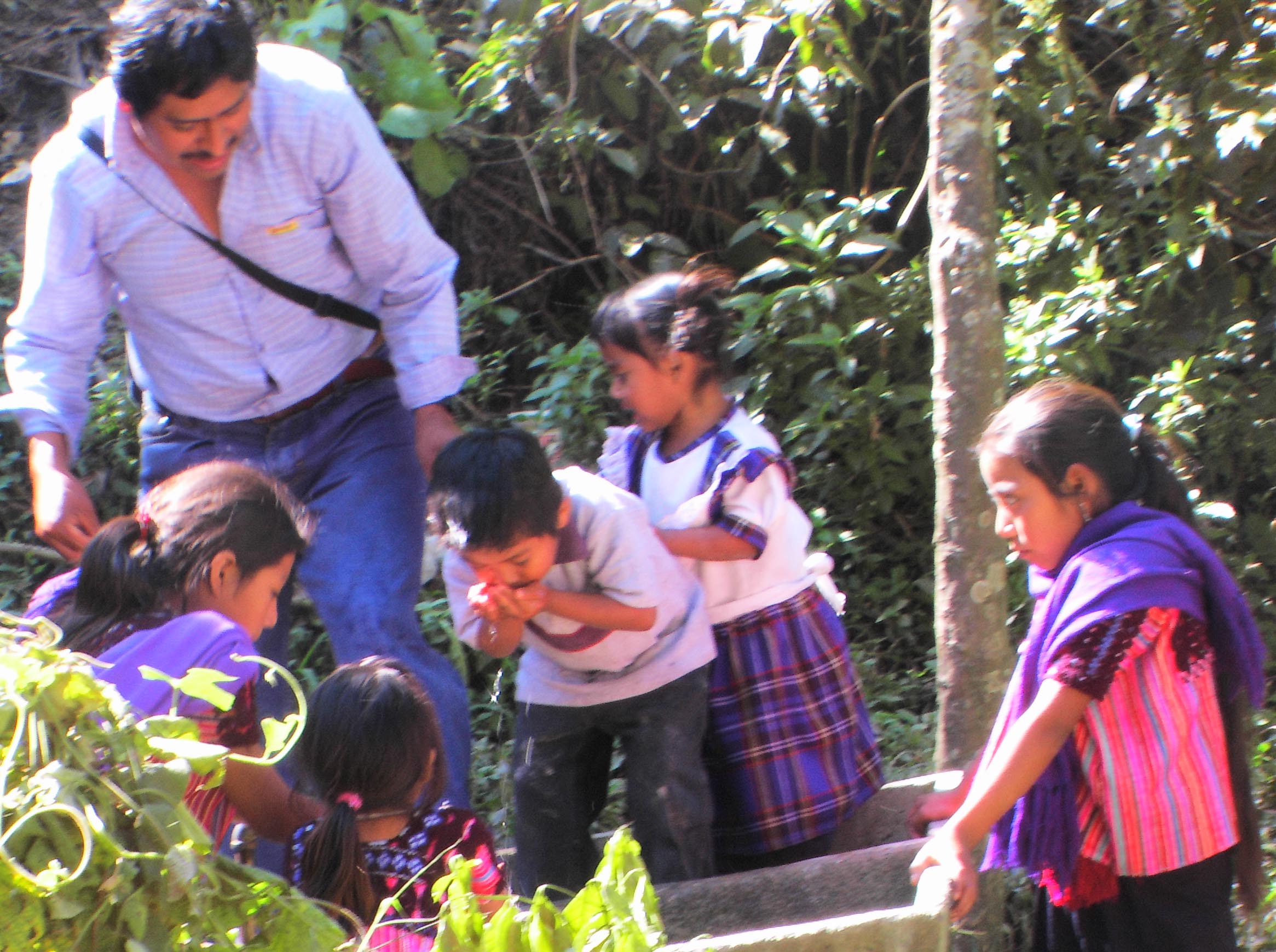 Chiapas,Mx drinking from lined well